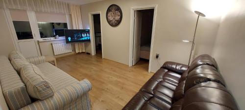 Shared lounge/TV area, Saase 3 Apartment in Mustamae