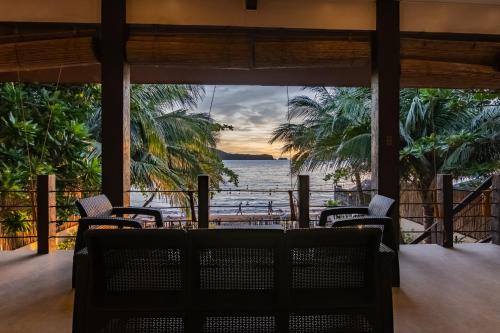 Balcony/terrace, DEKHAUS Amazing Beach Front Home in Nasugbu in Calayo