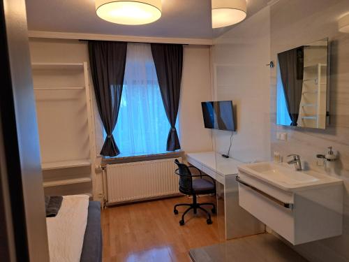 Flataid Gästehaus Graschi - gutes und günsiges Einzelzimmer - Steinbergstraße