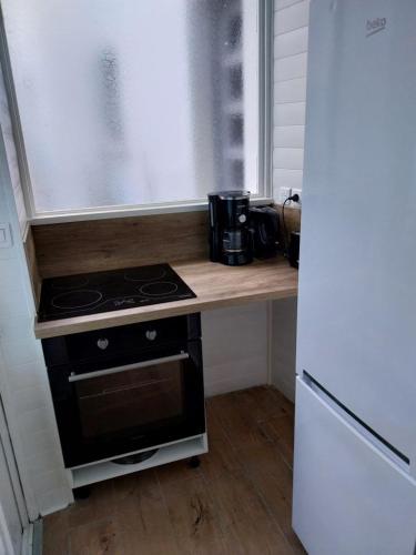 'Le patio' Appartement avec terrasse in โรย็อง