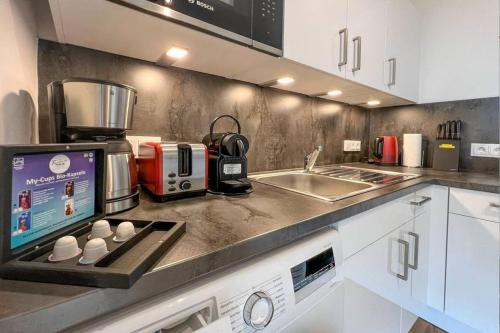 Kitchen, Maltes-Ostseekoje Parken frei vorm Haus, 500m zum Strand,Infrarotsauna,Magenta TV mit Netflix ,Disne in Olpenitz