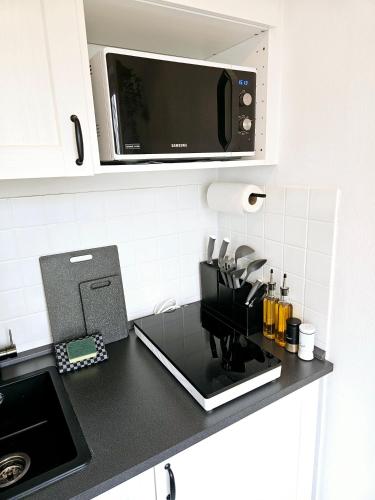 廚房, Like at home - moderne Wohnung in Königsbrunn - 30qm - Netflix (Like at home - moderne Wohnung in Konigsbrunn - 30qm - Netflix) in 柯尼希斯布倫