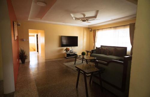 Felles stue/TV-område, Casa Consuelo Guest House in Takoradi