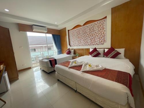 Triple Room with Balcony room in T & C Hotel Patong Beach
