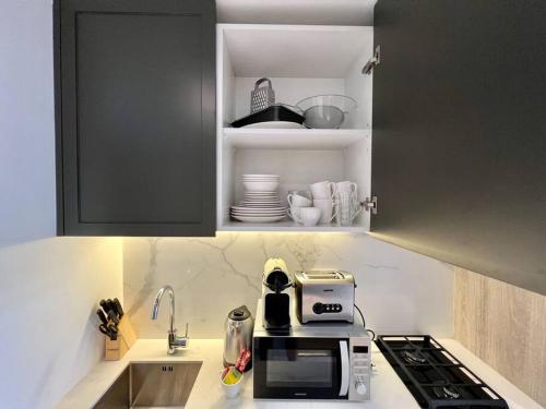 Waves - Ideal Dubai Retreat, Elegant Studio in Oxford 212, Dubaj (zdjęcie 8)