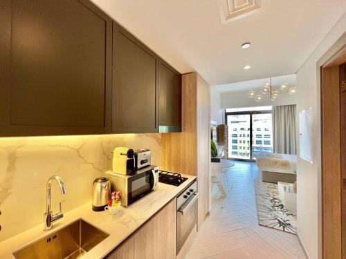 Waves - Ideal Dubai Retreat, Elegant Studio in Oxford 212, Dubaj (zdjęcie 7)