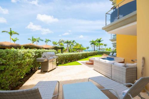 Beachfront - Garden Delight 2BR condo - E125-2, Palm-Eagle Beach (photo 4)