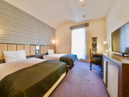 APA Hotel TKP Sapporo Eki Kitaguchi Excellent Room Type - Cozy Twin Room - Non-Smoking