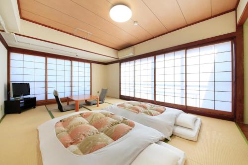 Shinjuku Urban Hotel Shinjuku Urban Hotel is a popular choice amongst travelers in Tokyo, whether exploring or just passing through. The hotel offers guests a range of services and amenities designed to provide comfort an