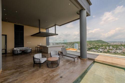Swimming pool, Espectacular Vista al Mar and Historic Center 2BR in Villa Barraza