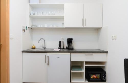 Central Castle Apartments Room Type - Studio with Sofa Bed with Parking
