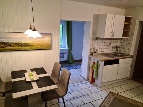 Kitchen, Ferienwohnung Soutterain in Zueschen