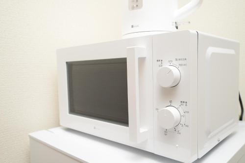 NYHotel 5 新宿2階建て4室1バスルーム1シャワー2トイレ