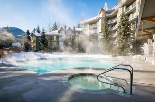 Inviting 2Bdrm Whistler Village Stay with Shared Pool, Sauna, and Hot Tub in Whistler, Canada