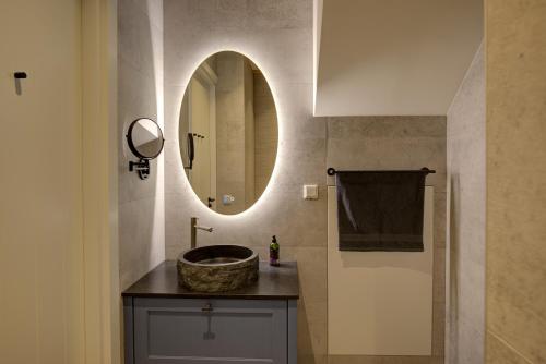 Fürdőszoba, B&B Doraki in Verspreide huizen Oldebroek