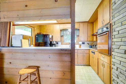 Waterfront Torch Lake Cottage with Dock and Fire Pit! in Central Lake, USA