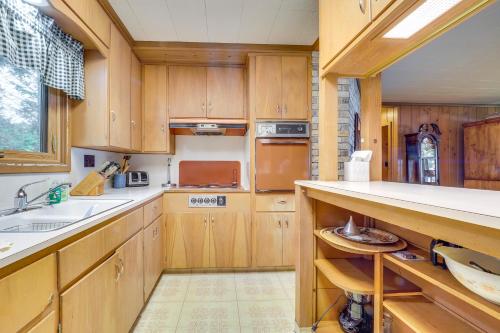 Waterfront Torch Lake Cottage with Dock and Fire Pit! in Central Lake, USA