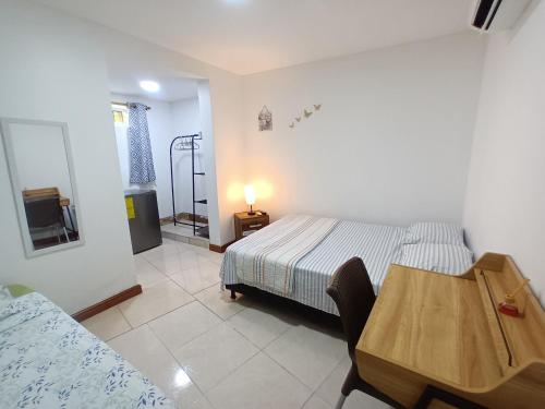Confortable y Central Habitación 1 cuadra de playa - image 5