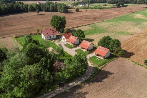Exterior view of Ostoja Lemany - domki na Kaszubach, sauna, balia-jacuzzi, plac zabaw, tyrolka , dwa boiska, miejsce