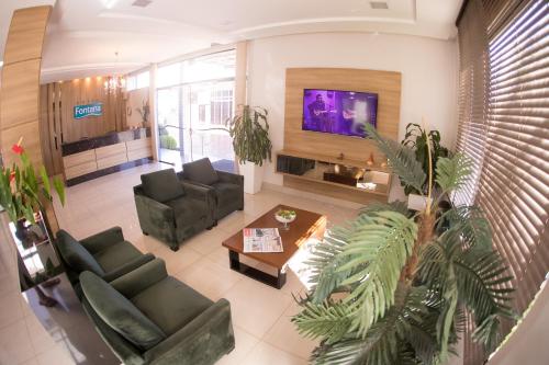 Koplietošanas atpūtas telpa ar TV, Hotel Fontana in Tapejara (Rio Grande do Sul)