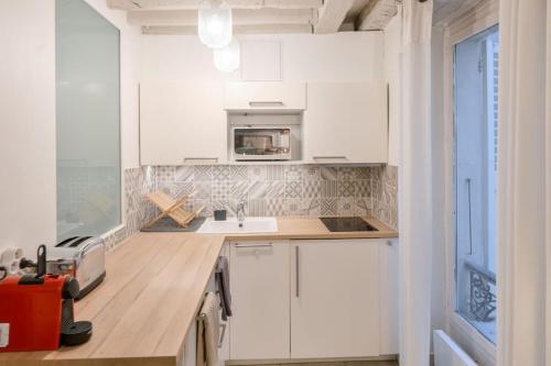Cosy Appartement en plein Marais - image 2