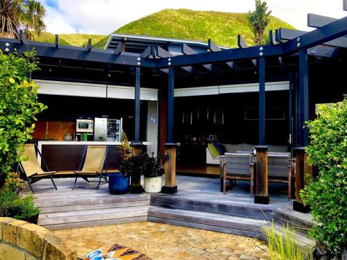 Viesnīcas āriene, Ahipara Beach Front, modern stylish bach in Ahipara