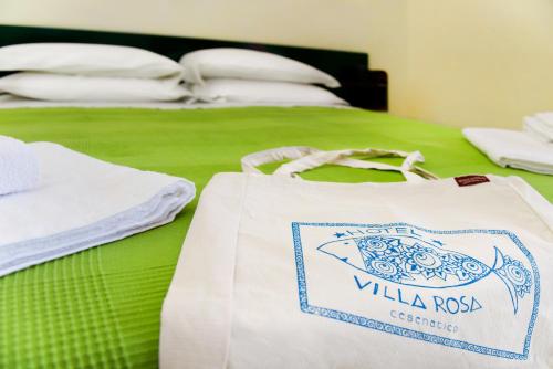 HOTEL VILLA ROSA - Tap to explore photos