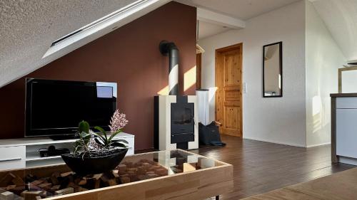Koplietošanas atpūtas telpa ar TV, Gemütliche Ferienwohnung (Gemutliche Ferienwohnung) in Burdenbach