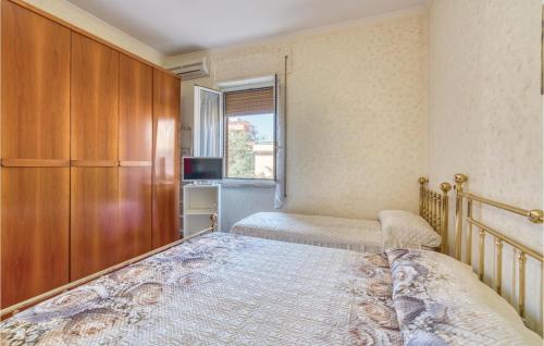One-Bedroom Apartment in Ladispoli (RM) - image 10