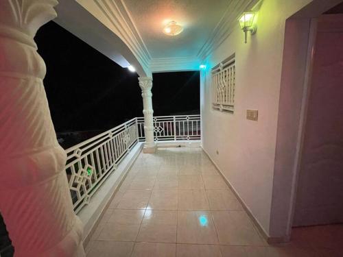 Terraza/balcón, Hébergement Confortable avec Jardin Restaurant et Services 24h24 (Hebergement Confortable avec Jardin Restaurant et Services 24h24) in Mirebalais