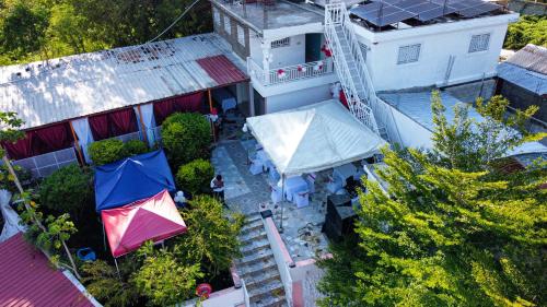Jardín, Hébergement Confortable avec Jardin Restaurant et Services 24h24 (Hebergement Confortable avec Jardin Restaurant et Services 24h24) in Mirebalais