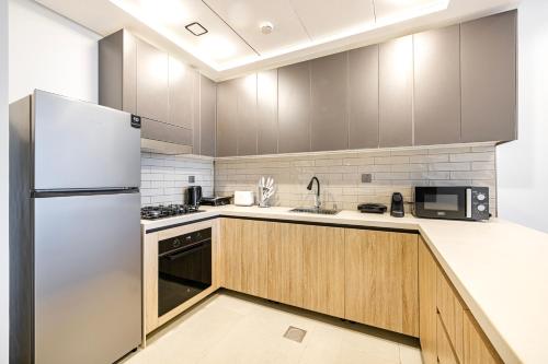 Daniels Charming 1BR At Jumeirah Garden City, Dubai (foto 10)