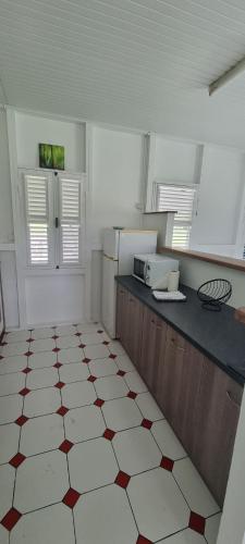 Haut de villa 1chambre climatisée à 3min de l'habitation Clément (Haut de villa 1chambre climatisee a 3min de l'habitation Clement) in Le Saint-Esprit