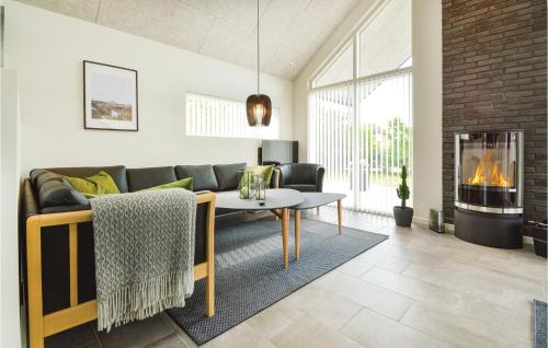 Four-Bedroom Holiday Home In Tarm in Hemmet