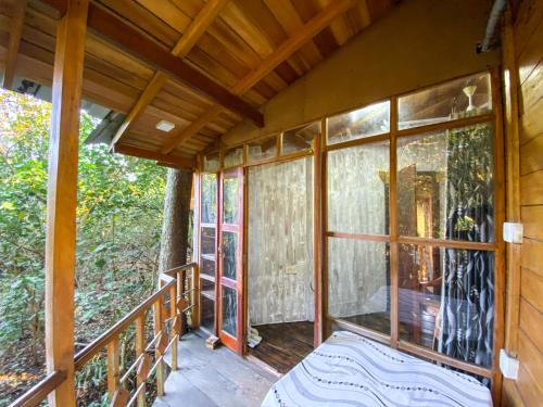 King Room with Balcony room in Seasons Four Eco Treehouse-Jungle View Breakfast & Walk to Beach