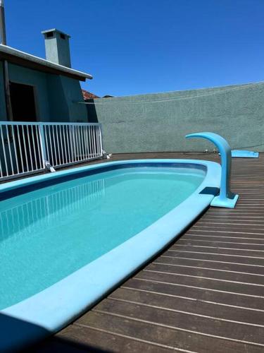 Casa com piscina próximo ao centrinho - Nova Tramandaí
