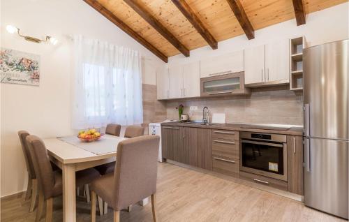 Kitchen, Awesome Home In Mundanije With Wifi in Rab
