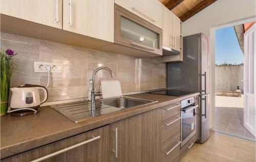 Kitchen, Awesome Home In Mundanije With Wifi in Rab