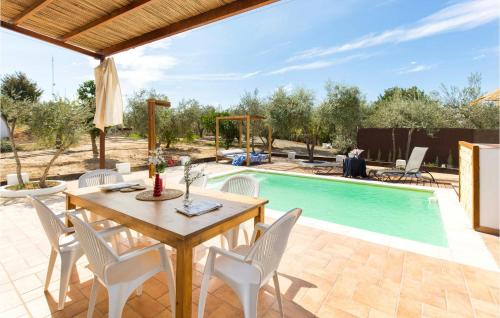Nice home in Arahal with Outdoor swimming pool WiFi and 3 Bedrooms - image 2