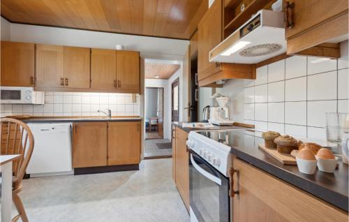 Kitchen, Three-Bedroom Holiday Home In Romo in Romo Kirkeby