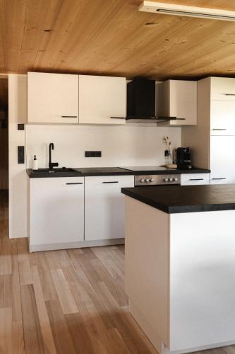 Konyha, Beerenhus in Au