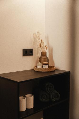 Fürdőszoba, Beerenhus in Au