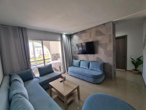 Shared lounge/TV area, Charmant appartement en residence piscine in Cabo Negro