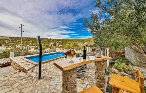 Swimming pool, Two-Bedroom Holiday Home In Drvenik Veli in Otok Veli Drvenik