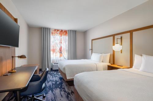 Extended Queen Suite with Two Queen Beds and Sofa Bed