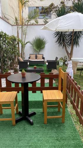 2 beds with garden view and terrace