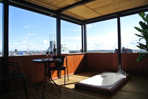 Open air bath, ウォーターゲート蟹江 レジャーホテル in Kanie