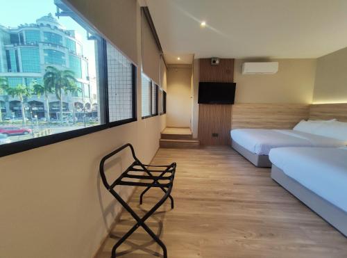 Deluxe Family Room room in Nuvo Hotel