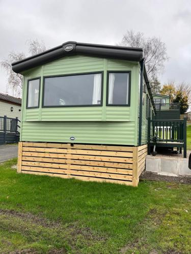 Superb luxury caravan, Todber Valley Holiday Park, gîte à louer Gisburn