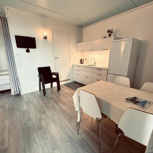 Konyha, Sjøberg Hotell og Ferie Leiligheter in Rennesoy